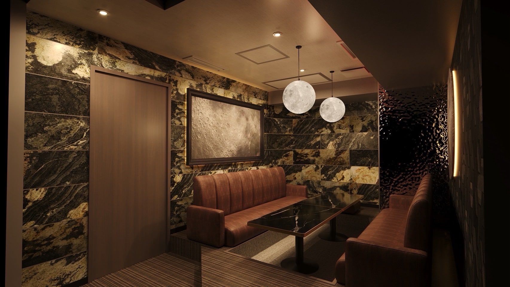 Private suite with framed moon artwork, marble wall, ribbed caramel booths